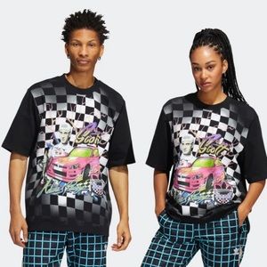 Brand new Jeremy Scott Adidas T shirt. Size L